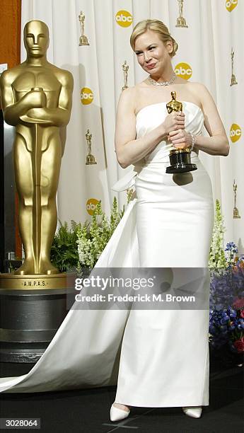 Actress Renee Zellweger poses with her Oscar for Best Supporting Actress during the 76th Annual Academy Awards at the Kodak Theater on February 29,...