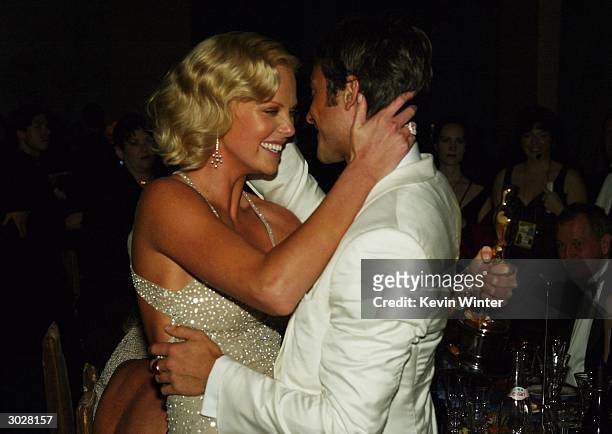 Actress Charlize Theron and Actor Stuart Townsend dance at the The Governors Ball after the 76th Annual Academy Awards at the Renaissance Hollywood...