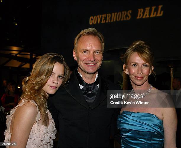 Singer Sting with daughter Coco and actress Trudie Styler pose at The Governors Ball after the 76th Annual Academy Awards at the Renaissance...