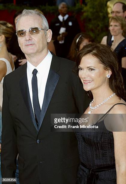 Actor Bill Murray and his wife Jennifer Butler attend the 76th Annual Academy Awards at the Kodak Theater on February 29, 2004 in Hollywood,...