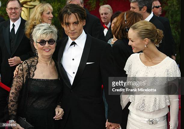 Actor Johnny Depp with mother Betty Sue Palmer and girlfriend Vanessa Paradis attend the 76th Annual Academy Awards at the Kodak Theater on February...