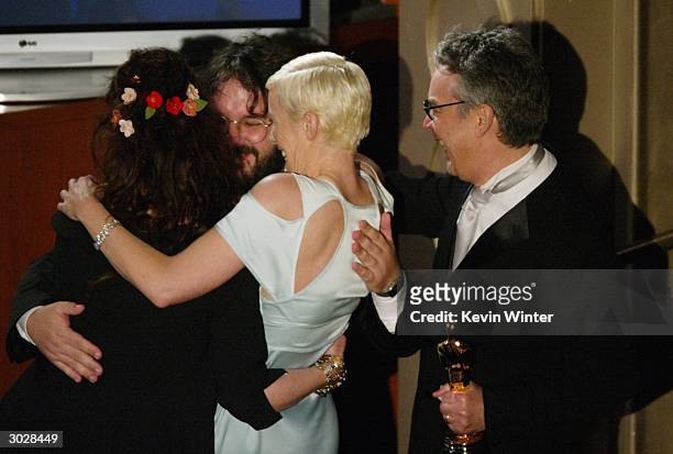 Fran Walsh, Peter Jackson, Annie Lennox and Howard Shore on stage during the 76th Annual Academy Awards at the Kodak Theater February 29, 2004 in...