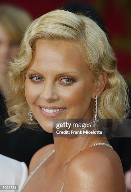 Actress Charlize Theron attends the 76th Annual Academy Awards at the Kodak Theater on February 29, 2004 in Hollywood, California.