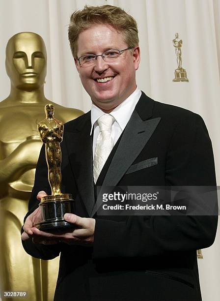 Screenwriter/Director Andrew Stanton poses with his Oscar for Best Animated Movie "Finding Nemo" during the 76th Annual Academy Awards at the Kodak...