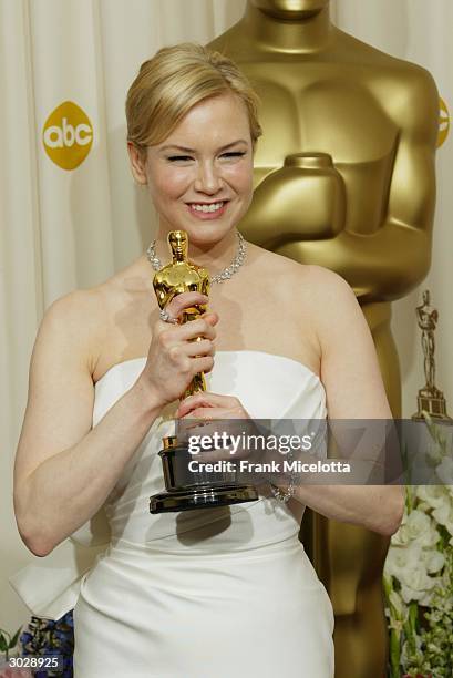 Actress Renee Zellweger poses with her Oscar for Best Supporting Actress during the 76th Annual Academy Awards at the Kodak Theater on February 29,...