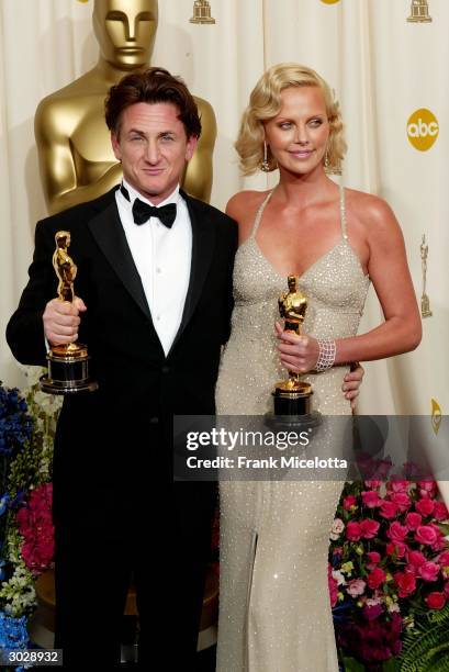 Actor Sean Penn and Charlize Theron pose with the Oscars for Best Actor and Best Actress during the 76th Annual Academy Awards at the Kodak Theater...