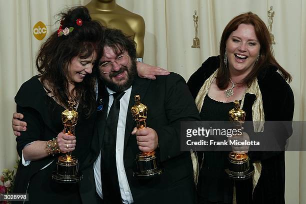 Writers Fran Walsh, Peter Jackson and Philippa Boyens, winners of Best Adapted Screenplay for "The Lord of the Rings; Return of the King" pose...