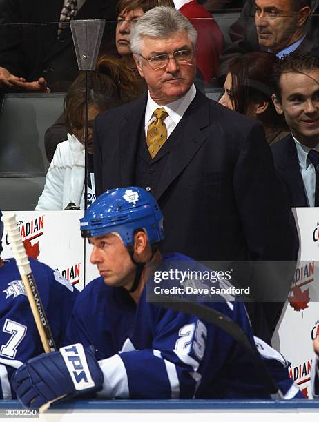 Head coach Pat Quinn of the Toronto Maple Leafs watches the game against the Carolina Hurricanes at Air Canada Centre on January 27, 2004 in Toronto,...