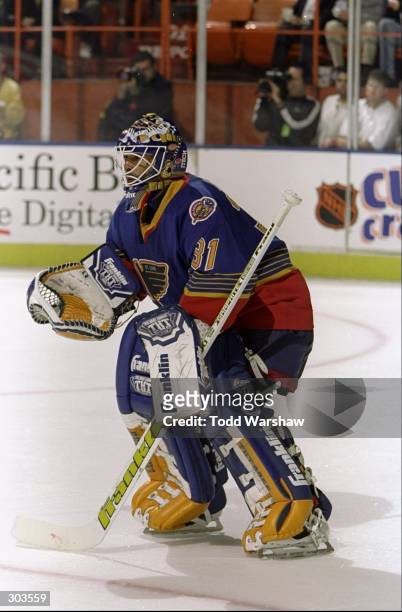 Goaltender Grant Fuhr of the St. Louis Blues in action during their NHL Playoff game against the Los Angeles Kings at the Great Western Forum in...