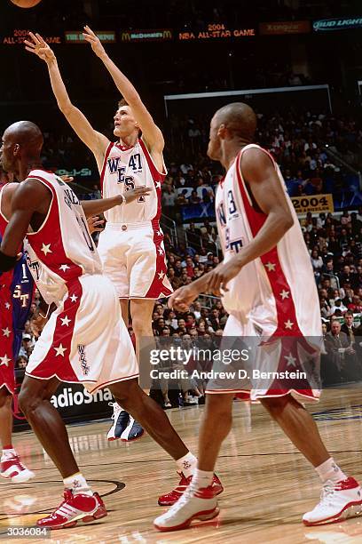 Andrei Kirilenko of the West All-Stars takes a jumpshot against the East All-Stars during the 2004 NBA All-Star Game at the Staples Center part of...