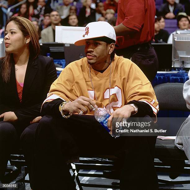 Allen Iverson of the East All-Stars looks on as a spectator during the 989 Sports Skills Competition on February 14, 2004 at Staples Center in Los...