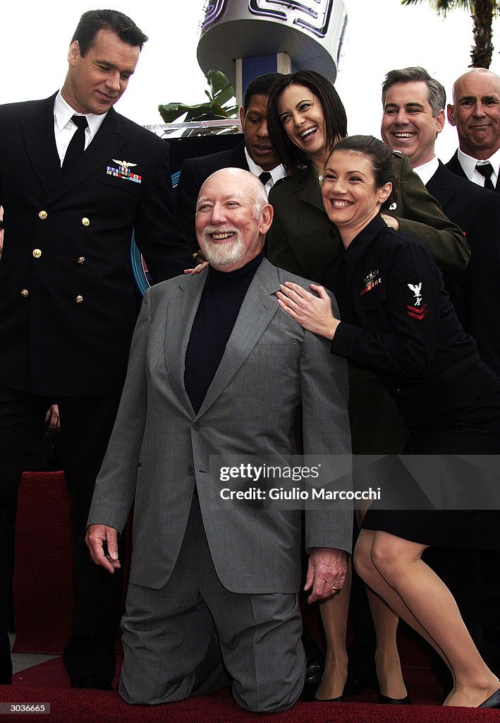 Television Producer Donald P. Bellisario , with his JAG cast… News