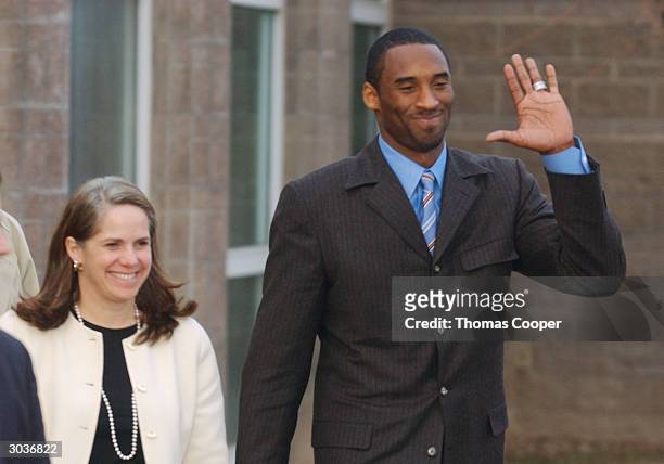 Los Angeles Lakers star Kobe Bryant and attorney Pam Mackey react to local area kids who where holding signs proclaiming Bryant's innocence March 2,...