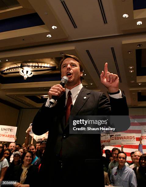 Presidential Candidate Sen. John Edwards gestures during a speech to supporters at the Georgia Tech Hotel and Conference Center March 2, 2004 in...