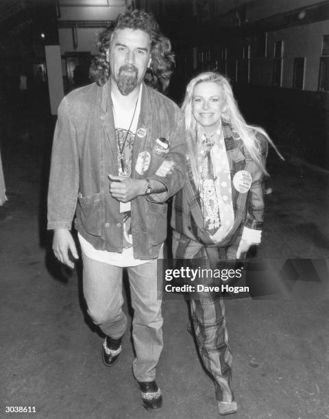 Scottish comedian Billy Connolly with his wife, Australian comedy-actress Pamela Stephenson, at a Michael Jackson concert at Wembley, London, July...