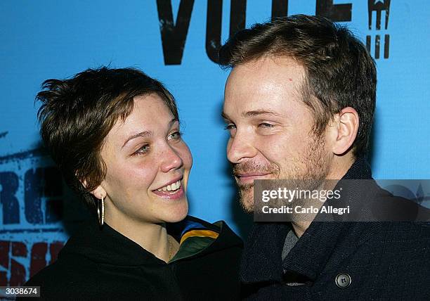 Actress Maggie Gyllenhaal and boyfriend Peter Sarsgaard arrive for Norman Lear's "Declare Yourself" event March 2, 2004 in Beverly Hills, California....