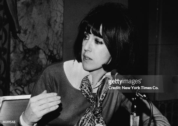 American screenwriter and director Nora Ephron gestures while speaking during a 'Women in Literature' conference at the Waldorf-Astoria Hotel, New...