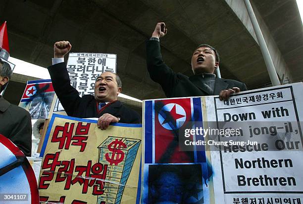 Anti-North Korean hold placards during a rally March 4 2004 in Seoul, South Korea. U.S. Officials said the chief problem in talks with North Korea is...