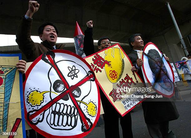 Anti-North Korean hold placards during a rally March 4 2004 in Seoul, South Korea. U.S. Officials said the chief problem in talks with North Korea is...