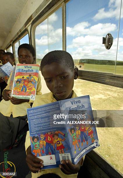 Children are seen in their Vukani senior primary school classroom set in an old school bus, 27 February 2004 in Qunu, located about 35 kilometers...