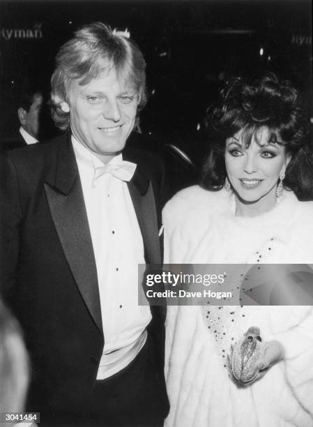 British actress Joan Collins with her second husband Peter Holm, shortly after their wedding, 26th November 1985.