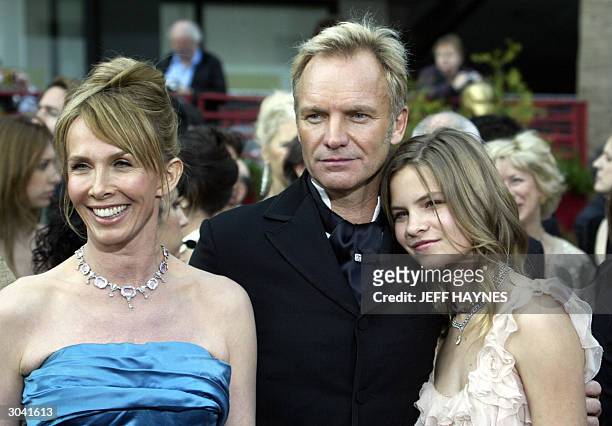 Singer Sting, his wife Trudie Styler and daughter Coco arrive for the 76th Academy Awards ceremony 29 February, 2004 at the Kodak Theater in...