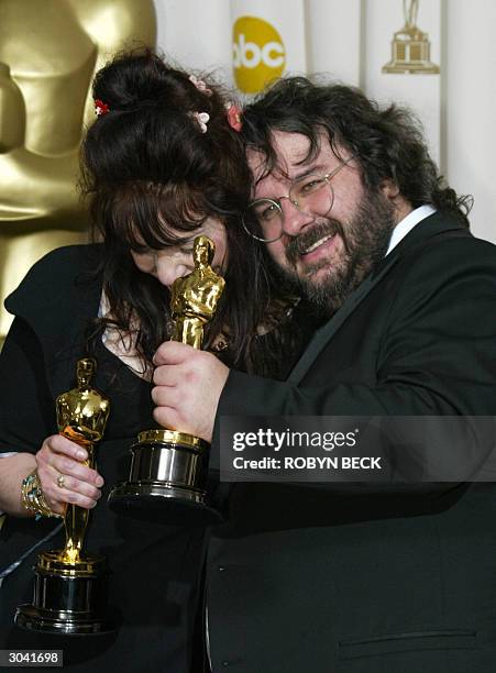 Fran Walsh and director Peter Jackson revel with their Oscar for Best Adapted Screenplay at the 76th Academy Awards ceremony 29 February, 2004 at the...