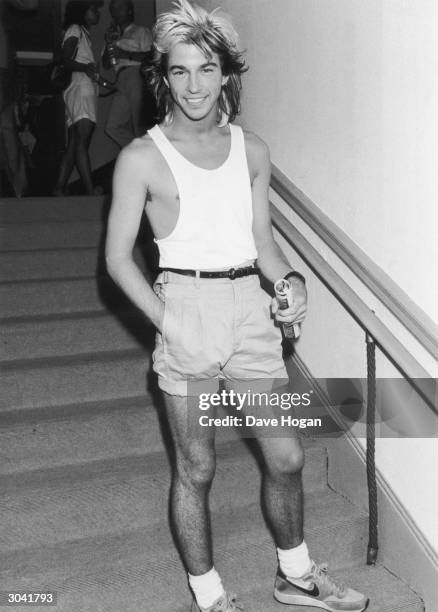 Limahl, lead singer of Kajagoogoo, presents himself bare-legged at the Astoria Theatre on the opening night of new musical 'The Juke Box', 14th July...