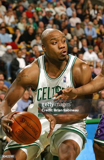 Brandon Hunter of the Boston Celtics moves the ball during the game against the Milwaukee Bucks on February 25, 2004 at Fleet Center in Boston,...