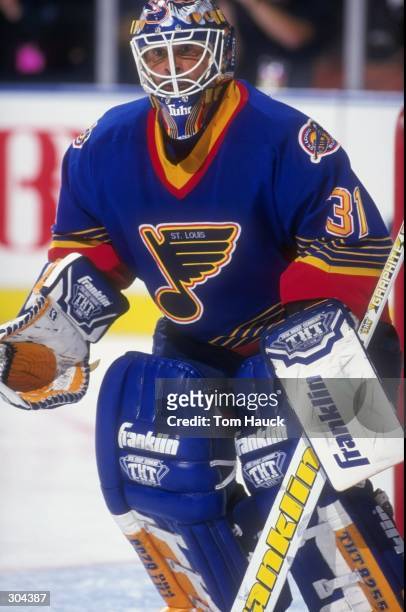 Goaltender Grant Fuhr of the St. Louis Blues in action during a playoff game against the Los Angeles Kings at the Great Western Forum in Inglewood,...