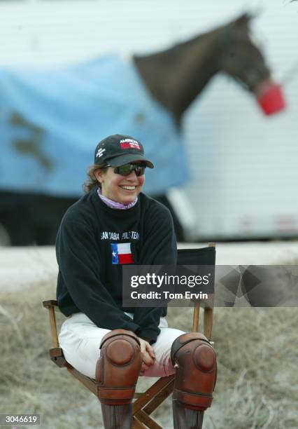 Dawn Maria Laurel sits down after playing polo at the International Polo Club Palm Beach February 6, 2004 in Wellington, Florida. Laurel is the third...