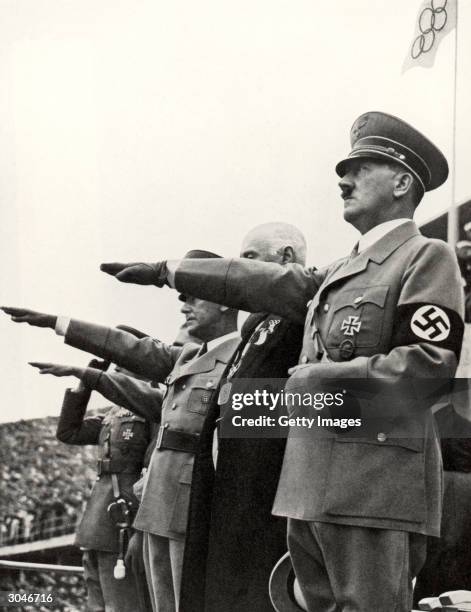 Adolf Hitler and his staff salute the teams during the opening ceremonies of the XI Olympic Games on August 1, 936 in Berlin, Germany.