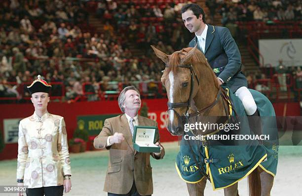 Baloubet du Rouet carrying Brazilian Rodrigo Pessoa is awarded the Prix Rolex after winning the FEI World Equestrian Games obstacle-jumping...