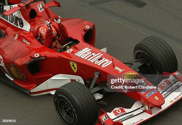 Michael Schumacher of Germany and Ferrari wins the 2004 Australian Grand Prix which which is round one of the FIA Formula One World Championship, on...