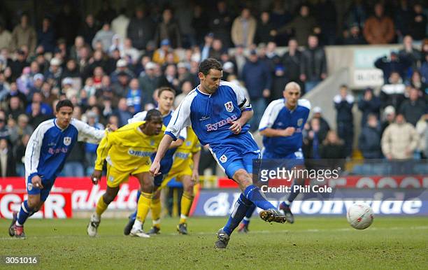 Kevin Muscat of Millwall misses a penalty shot during the FA Cup Quarter Final match between Millwall and Tranmere Rovers on March 7, 2004 at The New...
