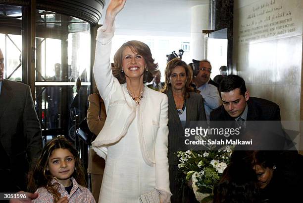Syrian First Lady Asma Al-Assad, wife of President Bashar al-Assad, waves upon her arrival at Beirut March 07, 2004. Arab first ladies are gathering...