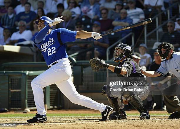 Designated hitter Juan Gonzalez of the Kansas City Royals hits against the Colorado Rockies on March 7, 2004 at Surprise Stadium in Surprise, Arizona.
