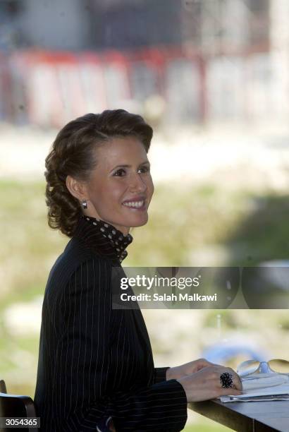 Syrian first lady Asmaa al-Assad, wife of President Bashar al-Assad, sits with Lebanese first lady Andree Lahoud at a restaurant March 8, 2004 in...