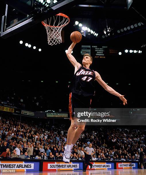 Andrei Kirilenko of the Utah Jazz dunks the ball during the game against the Sacramento Kings at Arco Arena on February 27, 2004 in Sacramento,...