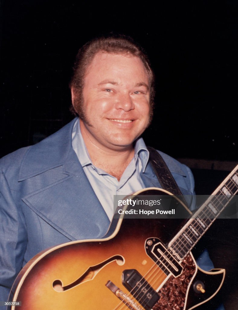 American country music singer and guitarist Roy Clark poses with his... News Photo Getty Images