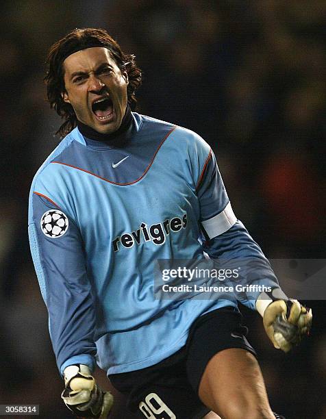 Porto goal keeper Vitor Baia celebrates after teammate Costinha scores the winning goal during the UEFA Champions League match between Manchester...