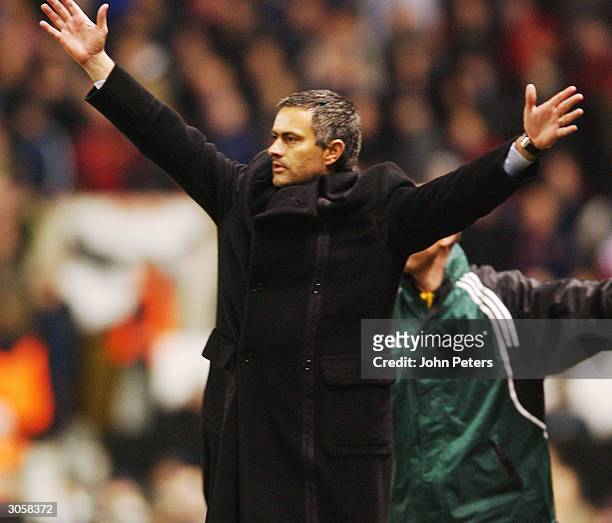 Jose Mourinho of FC Porto celebrates at full-time of the UEFA Champions League match between Manchester United and FC Porto at Old Trafford on March...