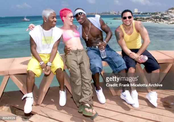 Rapper Sisqo, Singer Pink, Rapper Tyrese joke around during a photo shoot of MTV's Spring Break 2000 in Cancun, Mexico.