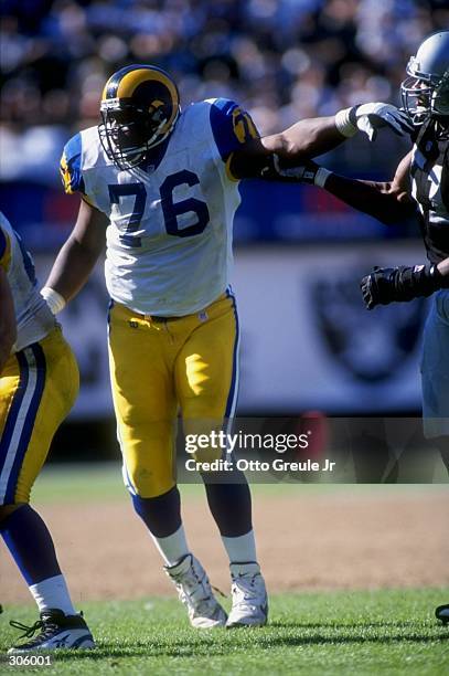 Offensive lineman Orlando Pace of the St. Louis Rams in action during the Rams 35-17 loss to the Oakland Raiders at UMAX Stadium in Oakland,...