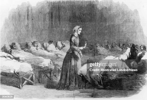 British nurse Florence Nightingale makes her rounds in the Barrack hospital at Scutari, during the Crimean War, 24th February 1855.