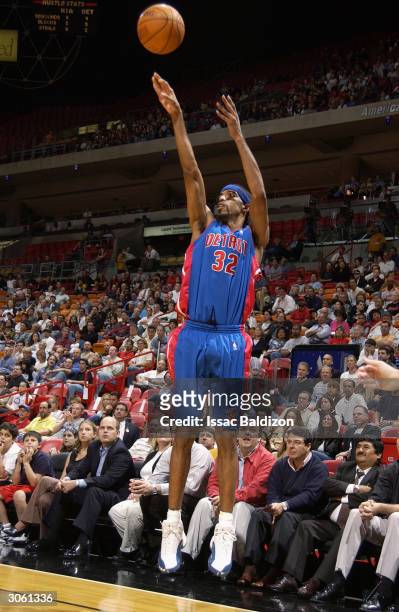 Richard Hamilton of the Detroit Pistons shoots against the Miami Heat during the game at American Airlines Arena on February 2, 2004 in Miami,...