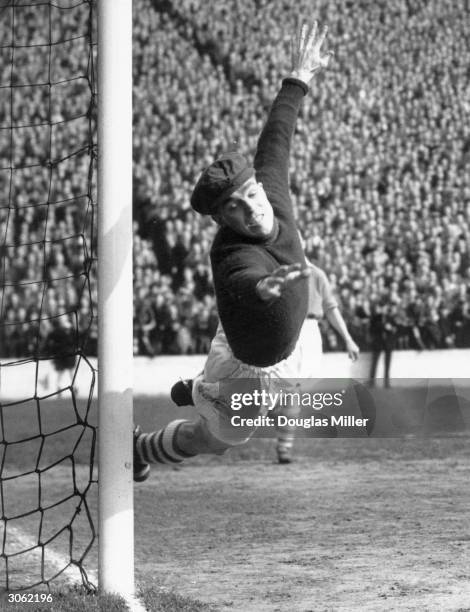 Charlton goalkeeper Sam Bartram making a save at the Valley during a game against Birmingham City.