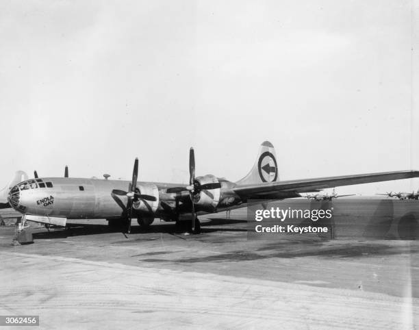 The Boeing B-29 Superfortress 'Enola Gay', which dropped the first atomic bomb on Hiroshima during World War II, stands on the runway at Tinian in...