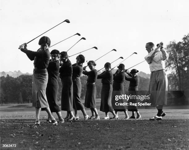 Keith Dalby giving a golf lesson at Finchley golf club.