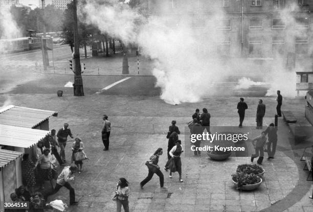 Tear-gas exploding in the city centre during riots on the second anniversary of the signing of the social accord in Gdansk for the independent...